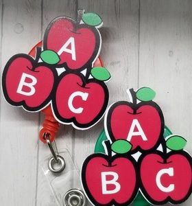 Apple belt clip badge reels